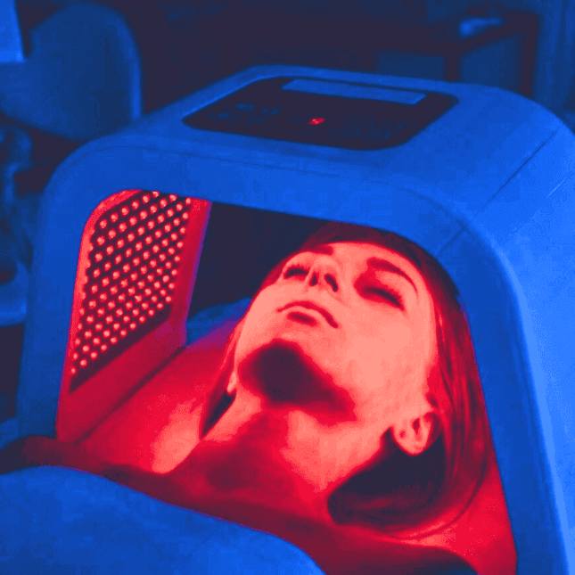 Woman undergoing LED light therapy treatment