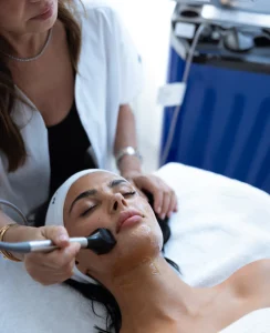 Facial treatment using Inmode Forma in a spa setting